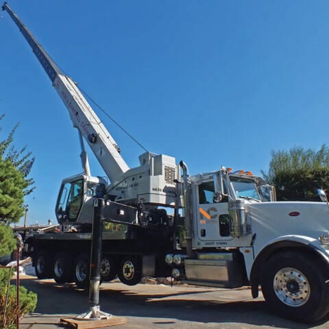 A boom truck used to do heavy equipment lifting.